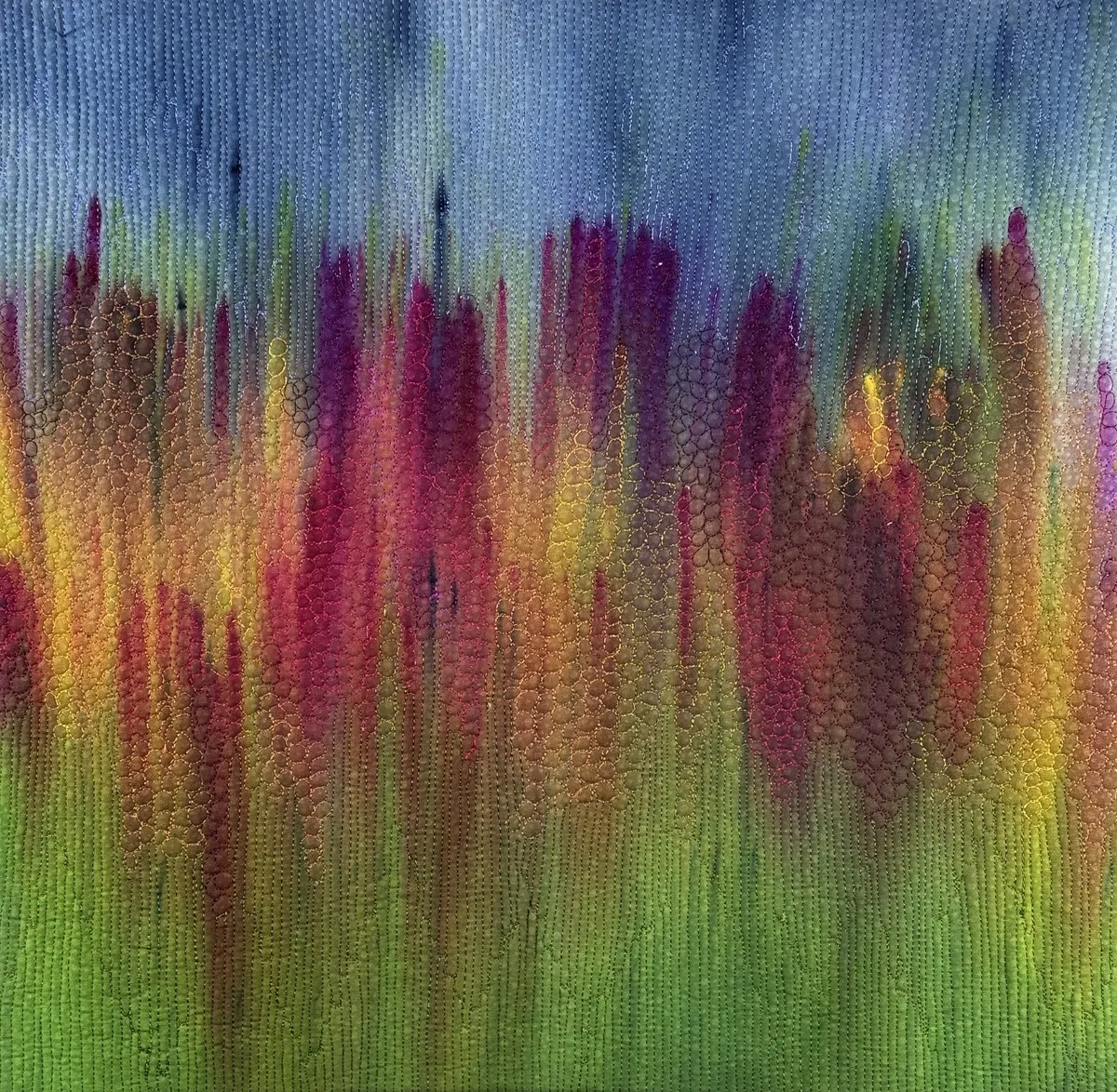 Abstract painting with vertical streaks of vibrant colors blending into each other.